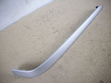 Trim top case left/molding top